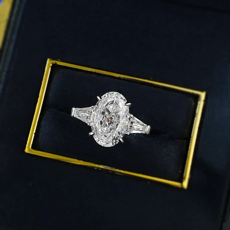 

NEWS925 Silver High Carbon Diamond Ice Flower Cut 8 * 12 Pigeon Egg European and American Ins Style Wedding Ring for Women