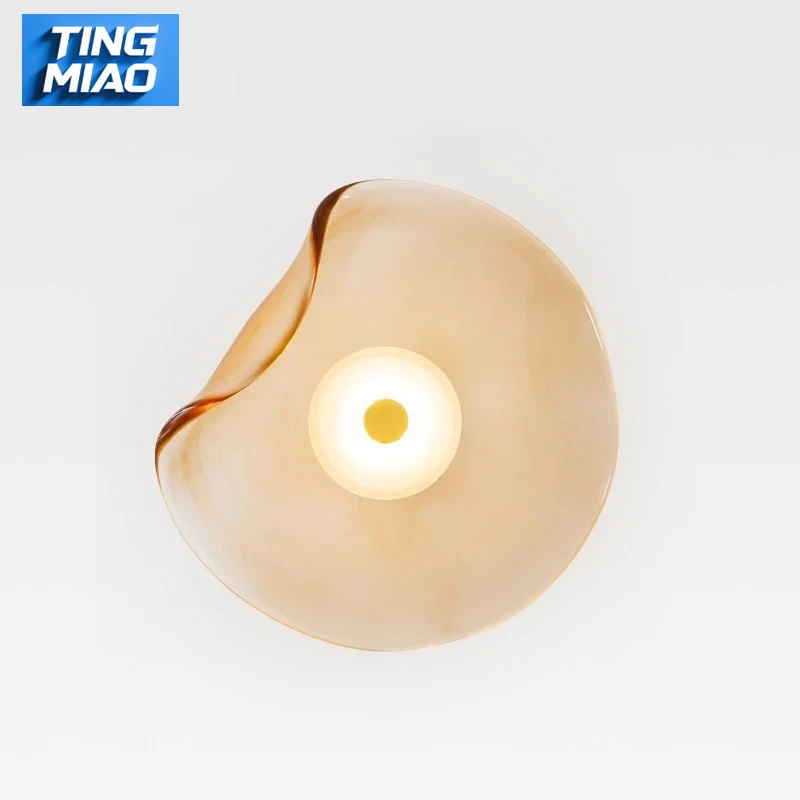 

2026 Modern Designer Entrance Hall Bedroom Headboard Decoration with Circular Background Wall and Irregular Glass UFO Wall Lamp