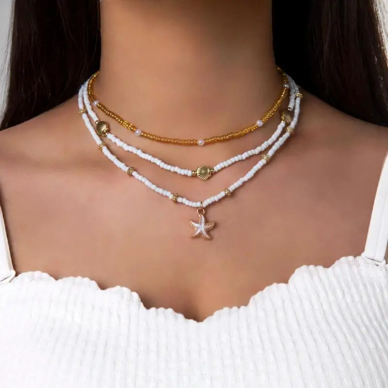 Gargantilla multicapa con cuentas de arroz y estrella de mar para mujer, collar con colgante de cola de pez de concha de perla de imitación bohemia, joyería de vacaciones
