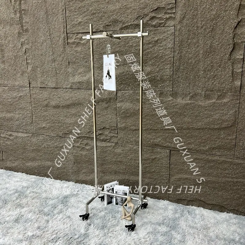 

Clothing store display rack Movable floor-to-ceiling stainless steel hanger Adjustable high and low wheel rack Display rack