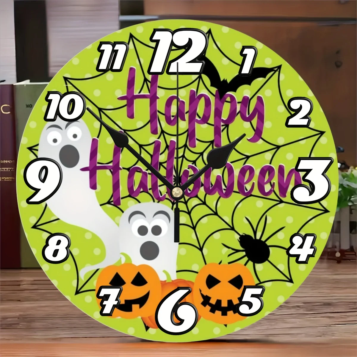 One Piece of a Stylish 10-Inch 2D Flat Wall Clock Featuring a Halloween Ghost And Pumpkin Design. It Has a High-Definition