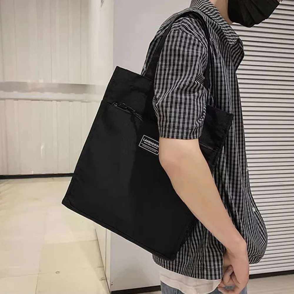 

Casual Male Commuting Tote Bag Large Capacity Waterproof Lightweight Handbag Versatile Fashion Canvas Shoulder Bag Unisex