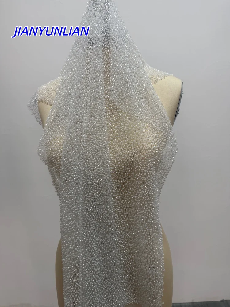 

Популярное свадебное платье с обильной вышивкой бисером, кружевная ткань шириной 130 см, кружево с жемчугом, продается на метры.