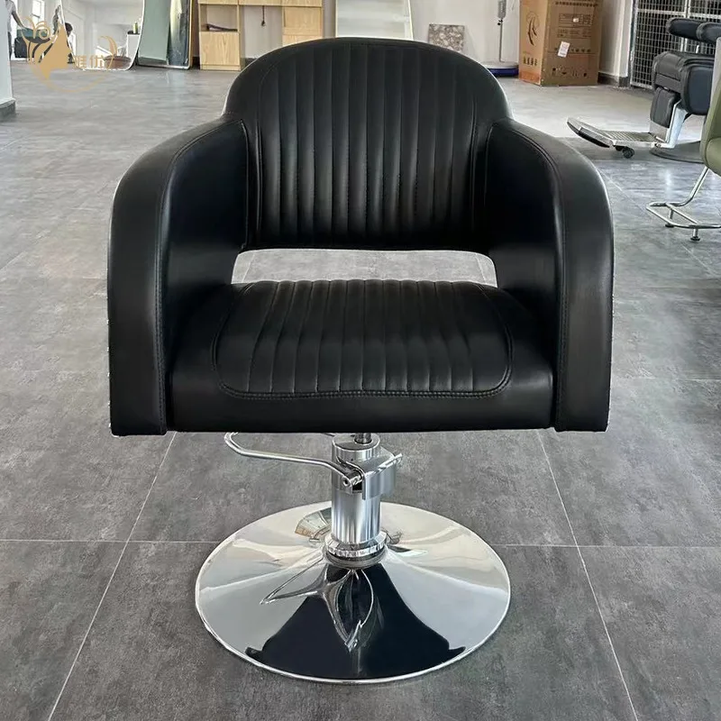 Industrial-Style Black Leather Barber Chair with Riveted Metal Sides and Hydraulic Base