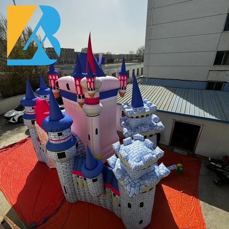 Castello gonfiabile gigante con sfondo da palcoscenico costruito personalizzato per giocattoli per organizzatori di feste di eventi
