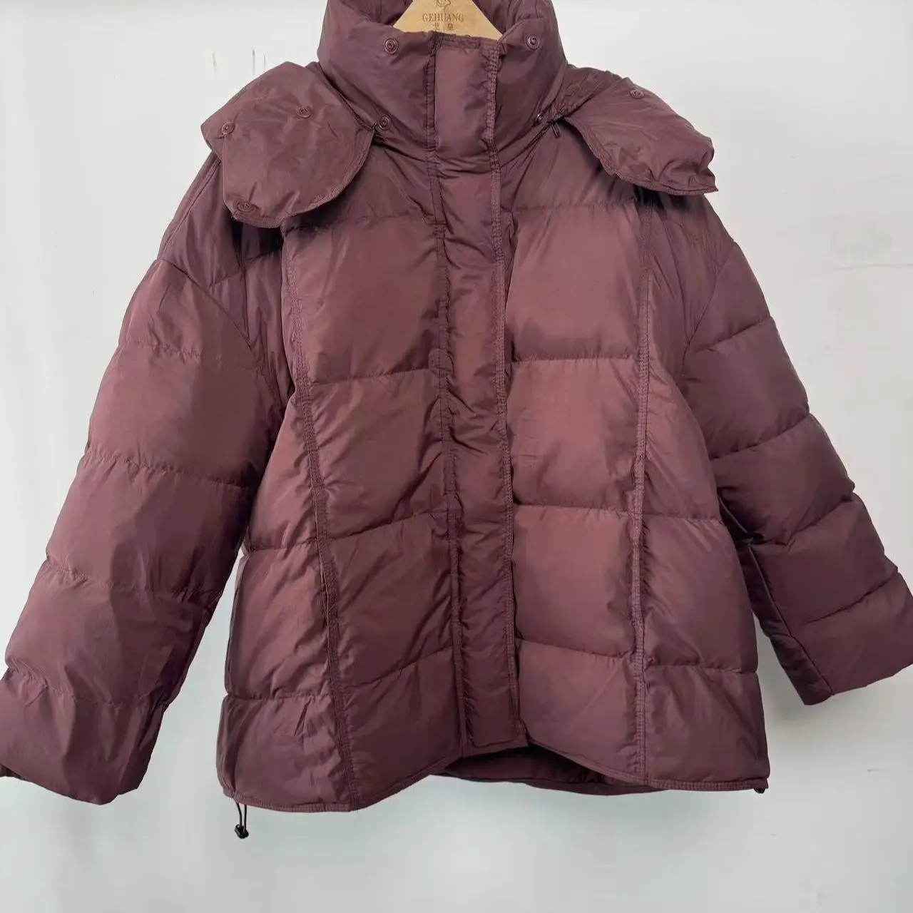 ヨーロッパの冬ホワイトダックダウン新しい女性のダウンジャケットルーズフード付き通勤特大ダウンジャケット