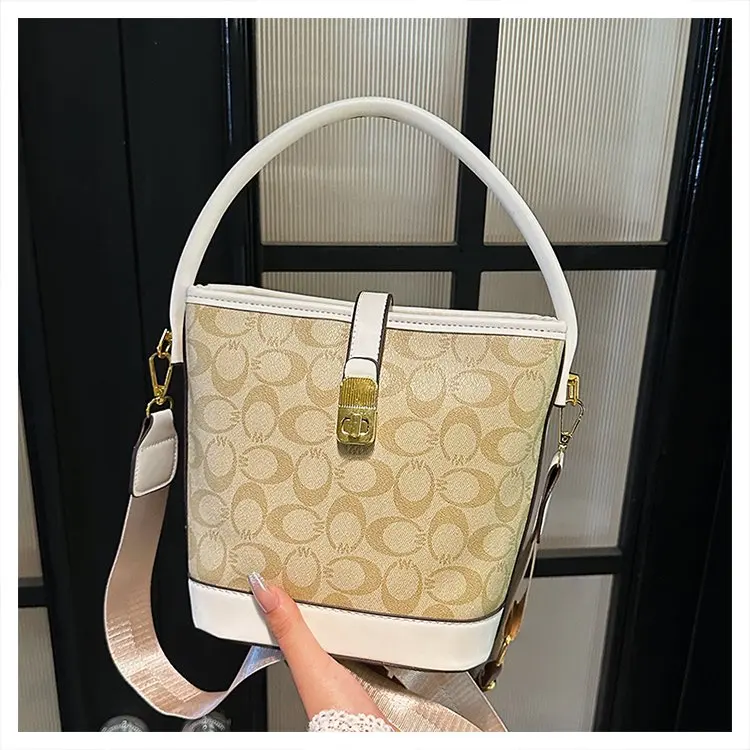 

Новая винтажная сумка-ведро 2026 года с монограммой для женщин, кожаная, с цветовыми блоками, металлическим замком, универсальная, на плечо и через плечо