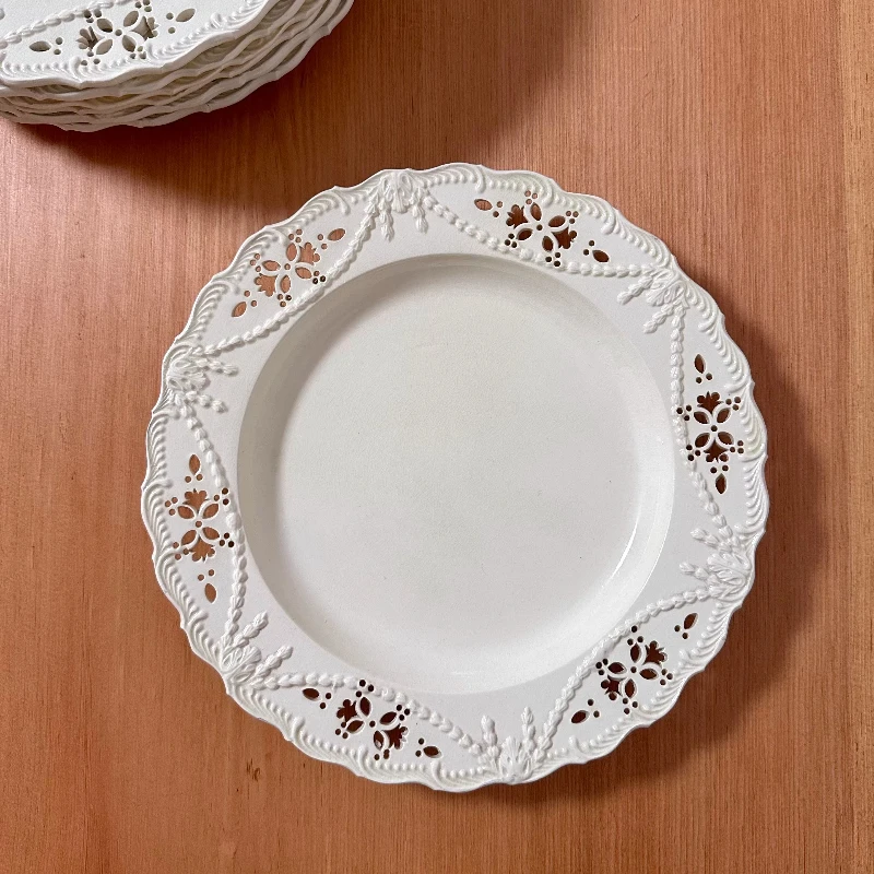 Cream plate, embossed hollow feather side plate
