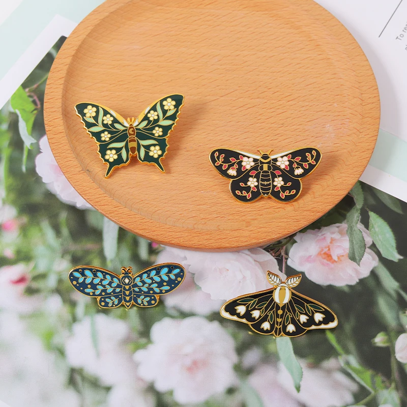 Butterflys Moth Hard Enamel Pins Custom Lily of the Valley Vine Brooches Lapel Badge Black Insect Plant Jewelry Gift for Friends