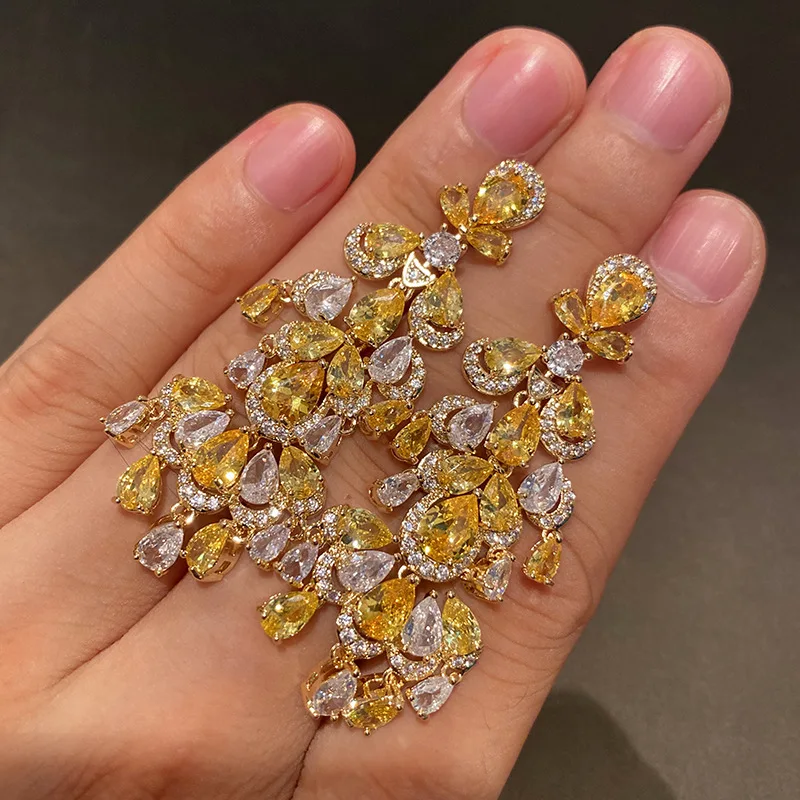 

Длинные серьги с желтыми кристаллами и кисточками, роскошные женские украшения, рождественская свадьба, вечеринка, пшеничное ухо, высокое качество, кубический циркон