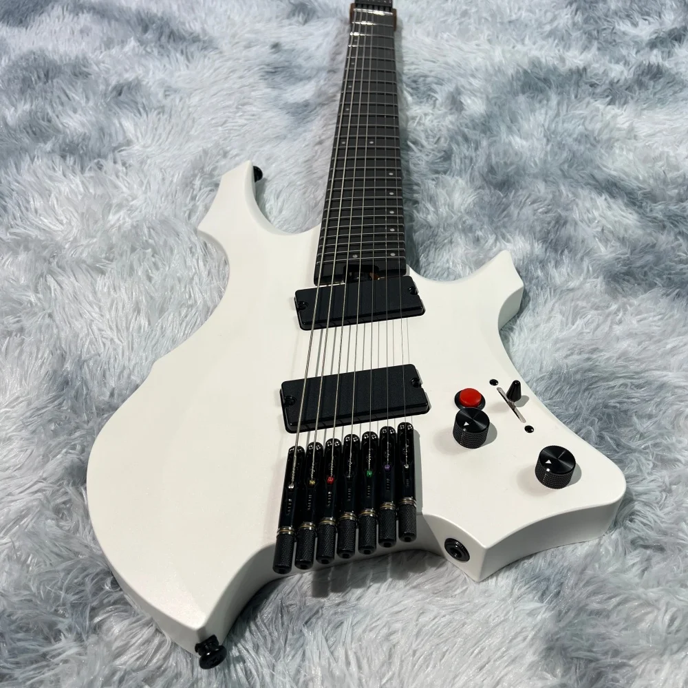 Headless electric guitar, 7-string fan frets, bone nut, active pickups, with killswitch, effective scale length 648mm-673mm, tra