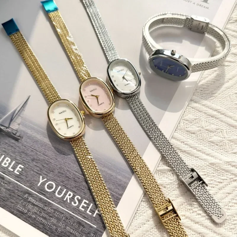 العلامة التجارية الجديدة ساعة كوارتز للنساء هدية فاخرة البيضاوي الهاتفي حجر الراين ساعة قابل للتعديل الفولاذ المقاوم للصدأ حزام ساعات المعصم بالجملة