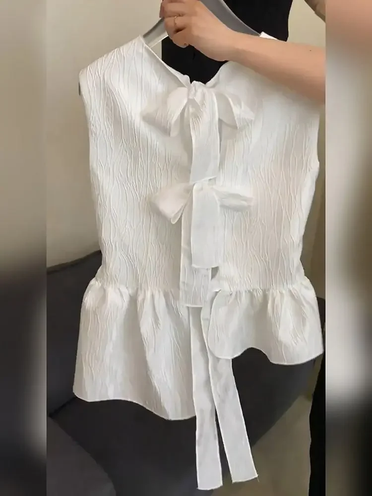Camicie bianche corte da pendolarismo chic francesi Top da donna Estate Nuovo fiocco irregolare con lacci Camicette senza maniche dimagranti Abbigliamento donna