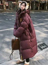 Piumino invernale da donna 2024 Nuovi cappotti imbottiti Cappotti larghi addensati Giù High Street Trend Capispalla lunghi da donna con cappuccio