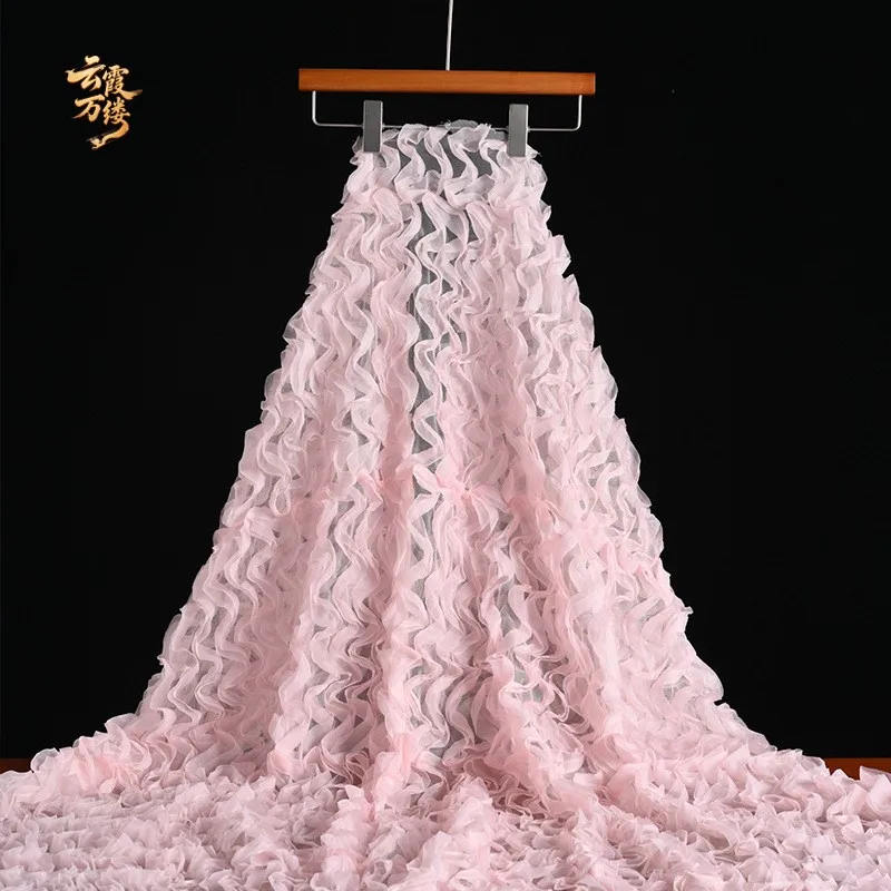 Pink three-dimensional mesh embossed semi-transparent fabric can be cut into dress and skirt clothing design