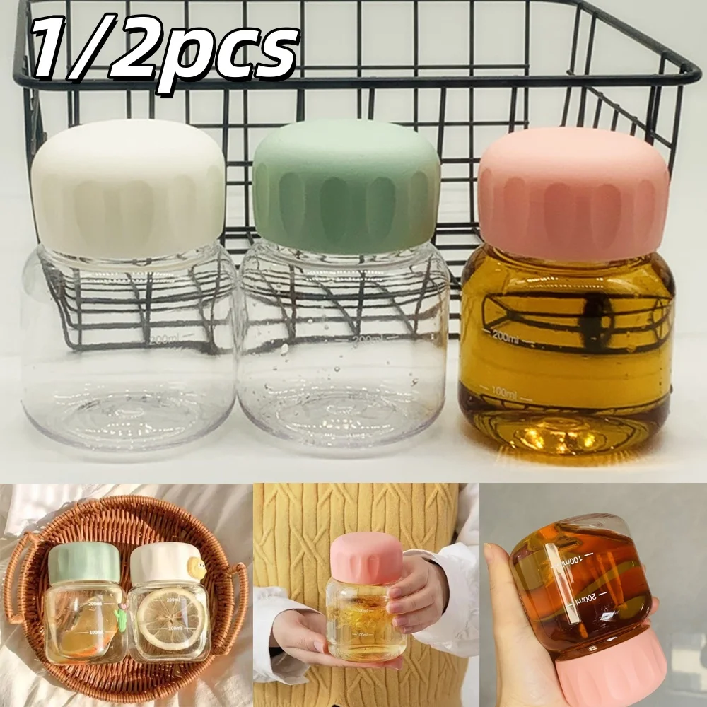 Botellas de agua transparentes con tapa, taza de jugo de leche portátil graduada, contenedor de bebidas adecuado para cocina al aire libre, 300ml, 1/2 ud.