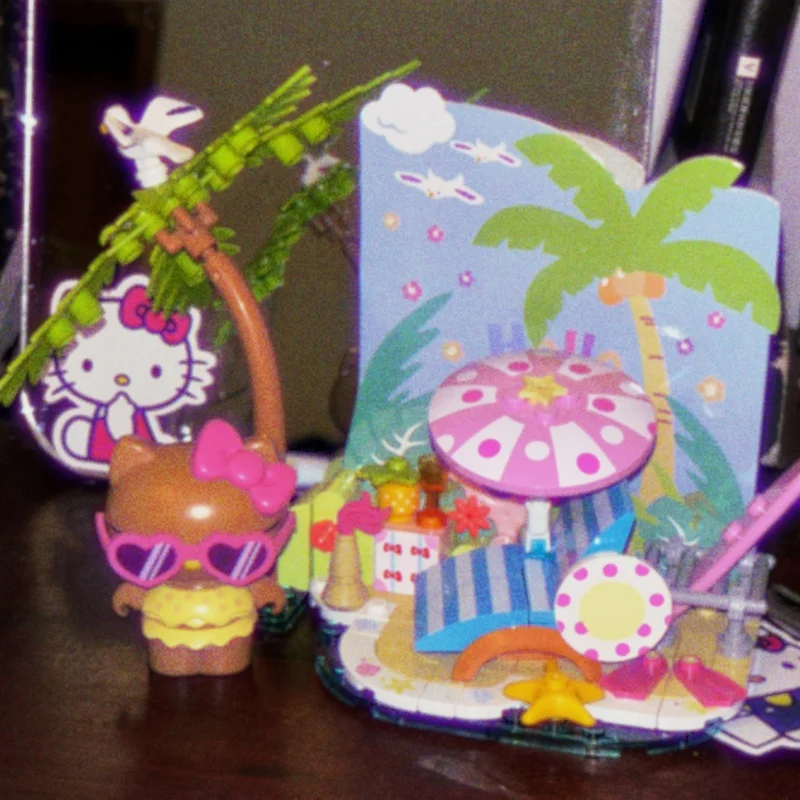 

Genuine Sanrio Summer Seaside Holiday Black Leather Hellokitty Collectible Ornaments Self Assembling Puzzle Toys For Girl Gifts