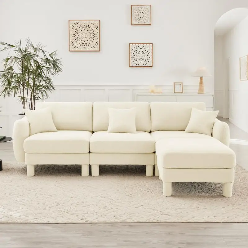 أريكة مقطعية على شكل حرف L قابلة للتحويل باللون البيج مع مساند للذراعين على شكل صدفة، وعثماني قابل للإزالة وأرجل أسطوانية ملفوفة