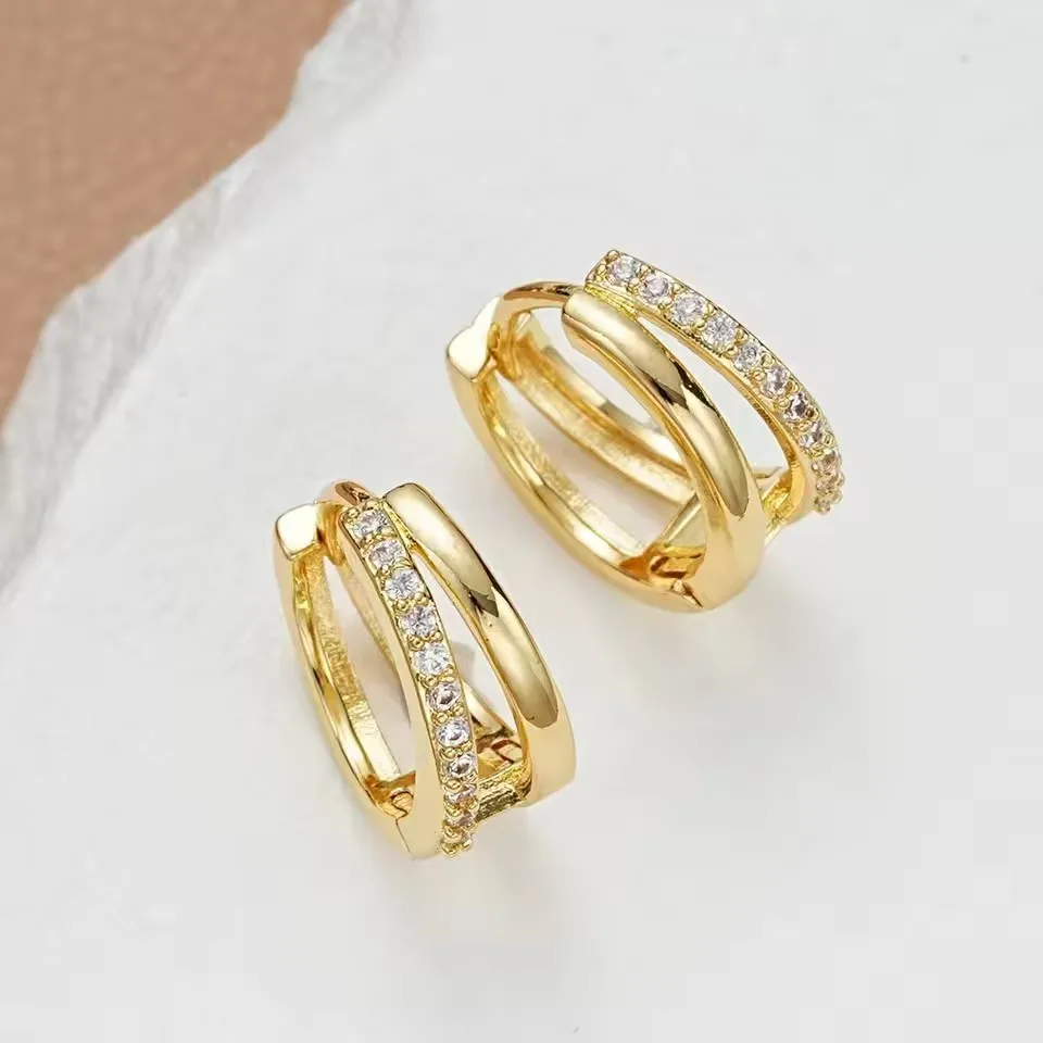Double-ring diamond-encrusted stud earrings for women, featuring a stylish, unique, and premium look