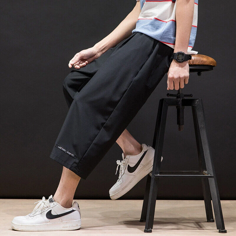 

Японские мужские брюки из ледяного шелка, тонкие свободные брюки с эластичной резинкой на талии, мужские брюки до середины икры, однотонные укороченные брюки с карманами