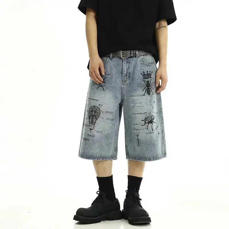 

Unisex American street style graffiti print denim shorts 2026 summer loose retro trendy style.