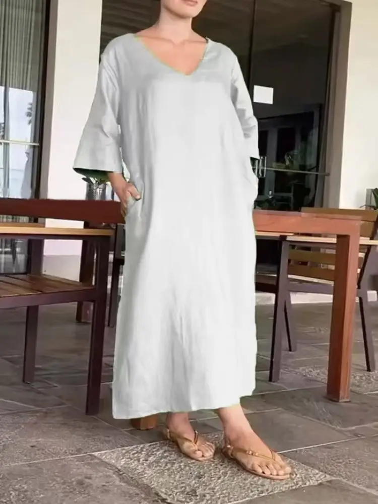 

Fashion new solid color cotton and linen v-neck with double slits at the hem, loose and long style