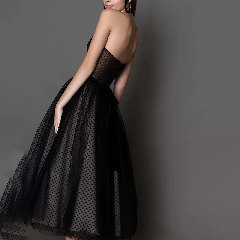 Abiti da sera eleganti senza spalline in tulle nero Abiti da ballo per feste formali Abiti da ballo da sera in pizzo a trapezio lunghi fino al tè personalizzati