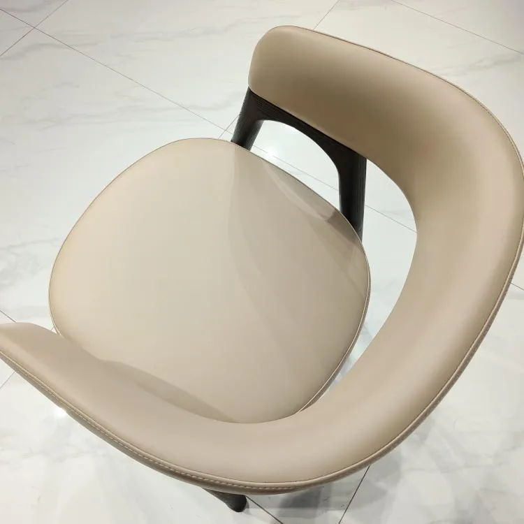 

-Modern minimalist white dining chair wing back armchair with soft artificial leather stainless steel for hotels