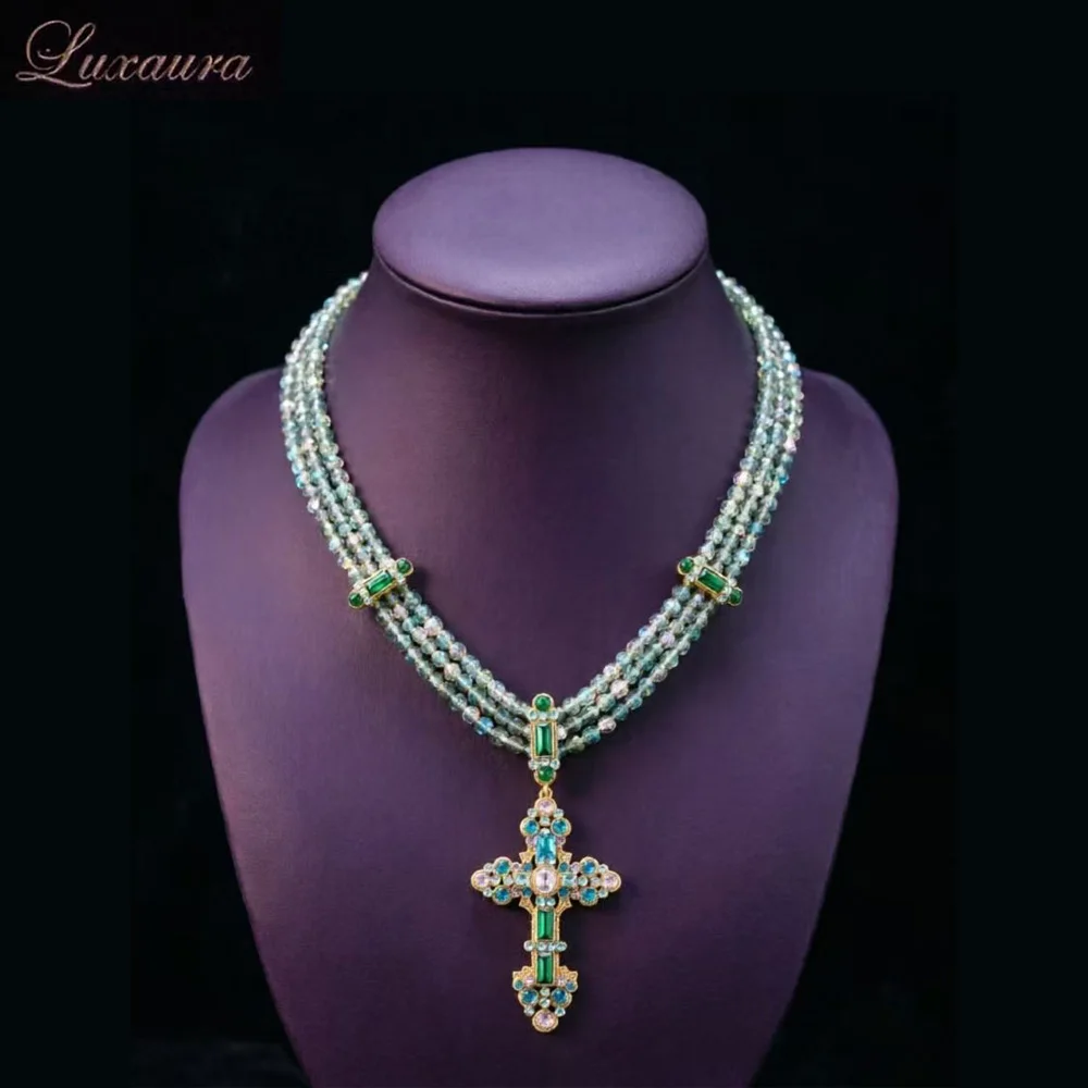 

Vintage jewelry featuring a fashionable and classic blue geometric necklace design paired with Bohemian style women's necklace