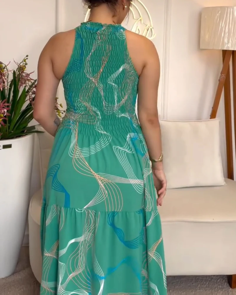 

Eye - Catching Abstract Print Halter Sleeveless Dress with Shirred Layered Maxi Design for Vacations
