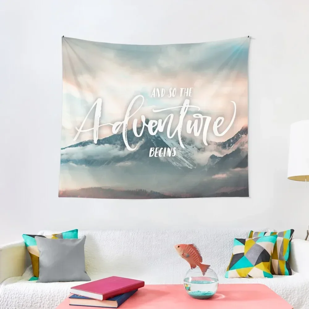 

And so the adventure begins elegant cursive letter red sky Mountains with clouds and fog quote HD High Quality Online S Tapestry