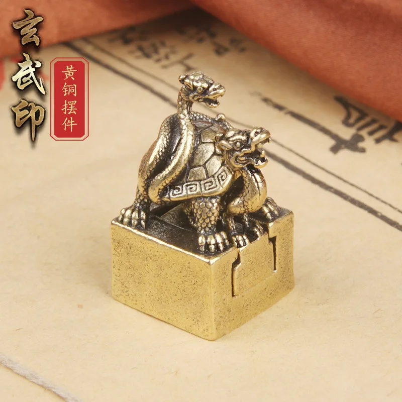 

Ming and Qing Dynasties brass Xuanwu seal desktop ornament Ruizhu carving child and mother copper idle bronze ware