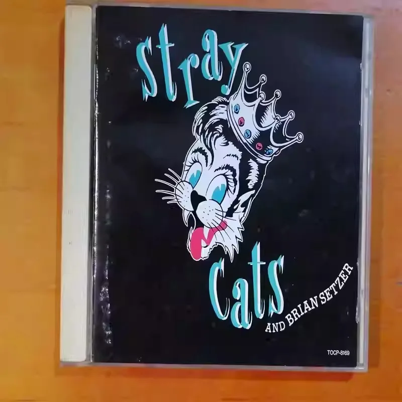 

Definitive Retro Rock New Wave CD Album, High-Energy Rockabilly Live Show Music, Classic Brian Setzer Band Collection.