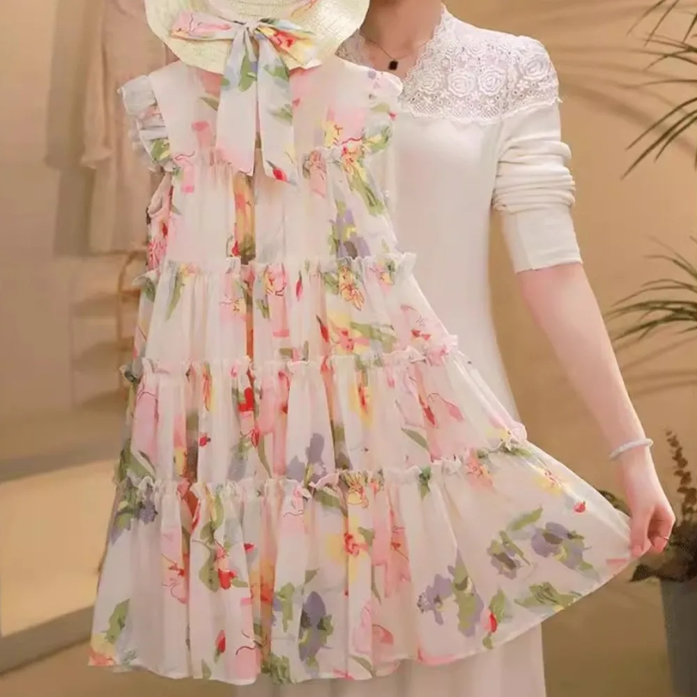 Versión coreana moda 4-13Y niña flor impresa princesa pastel vestido verano sin mangas gasa adolescentes playa vacaciones ropa