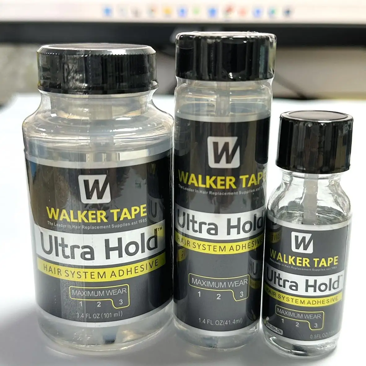 

0.5/1.4/3.4 FL OZ Ultra Hold Hair System Adhesive Maximun Wear 3 Walker Tape The Leader In Hair Replacement Supplles