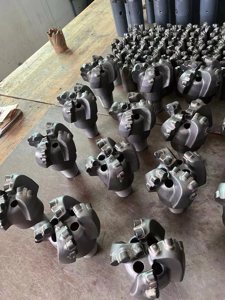 Deep water well drill bit/ground source heat pump drill bit/mine blasting hole/grouting hole/FS spiral four-wing arc angle