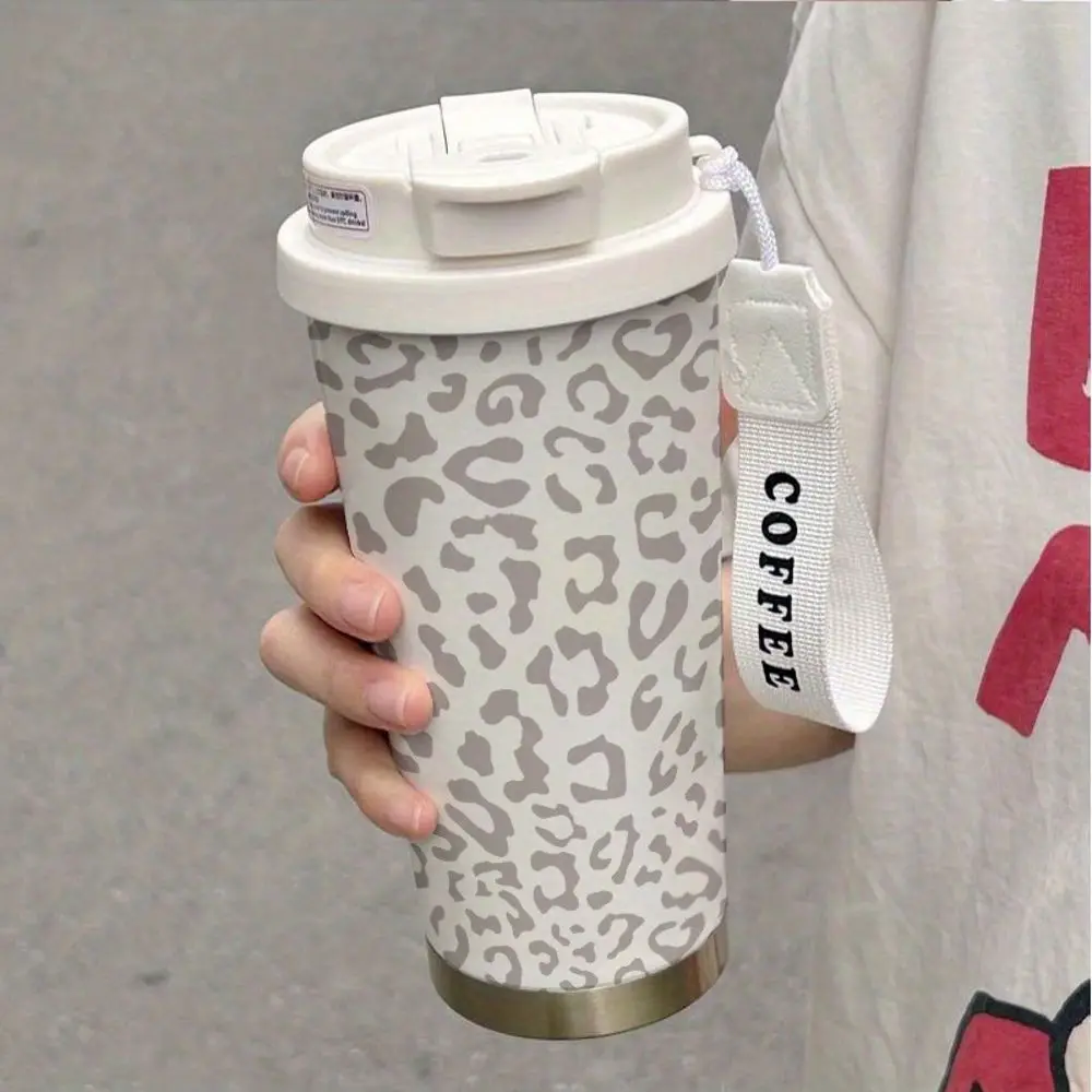 18ounce Stainless Steel Insulated Travel Mug. Brown Leopard Print Design. Double Insulation Hot And Cold Beverages. Comes With A Carrying Strap. Car Cup. Coffee Mug. Birthday.. Halloween. Tumbler With Lid And Straw