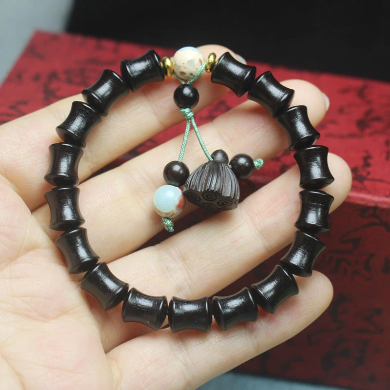 

Ebony bamboo knot bracelet, ebony small lotus pod carved pendant, prayer beads and decorative accessories for men and women