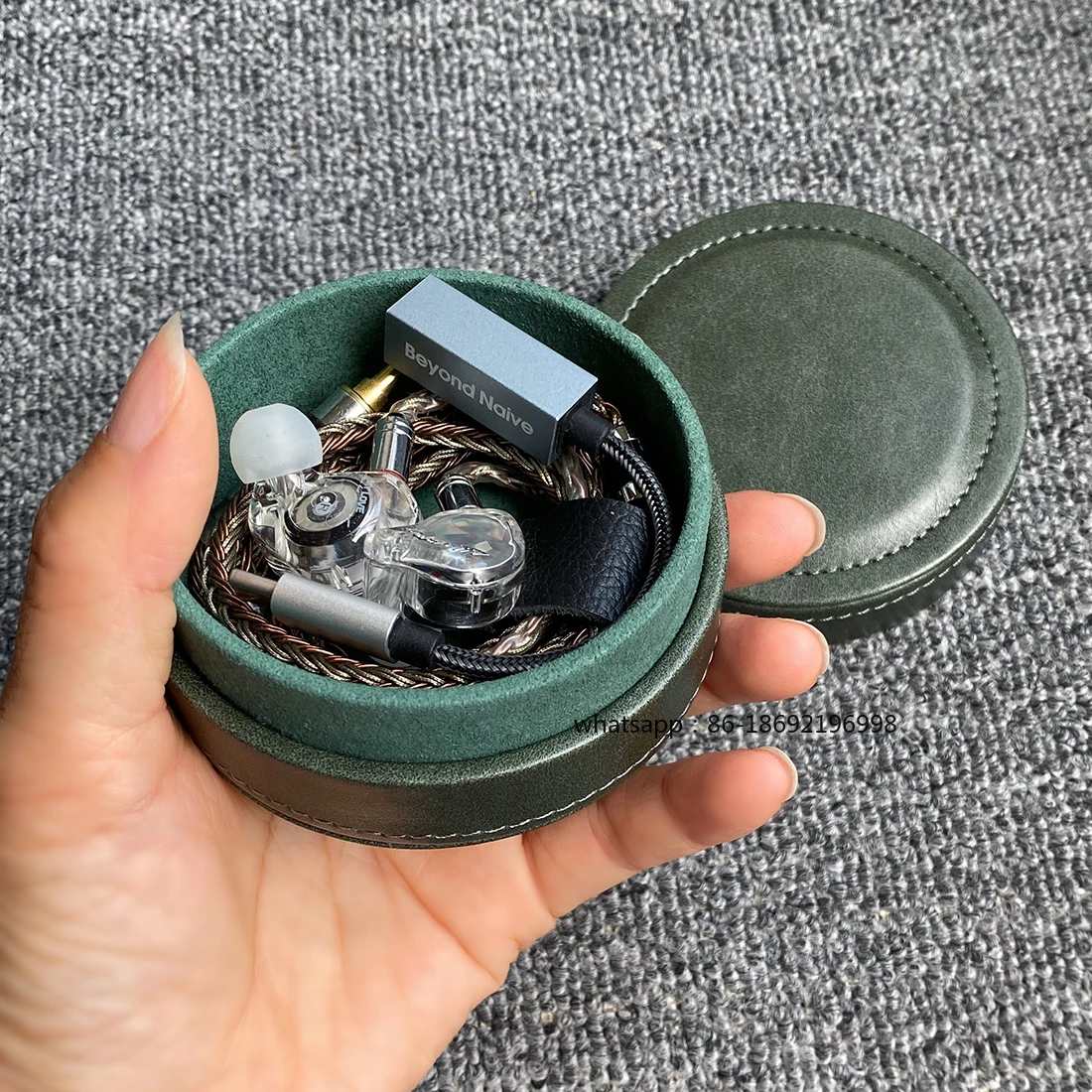 

Высококачественная кожаная сумка ручной работы по индивидуальному заказу, устойчивая к давлению коробка для наушников, портативная круглая коробка.