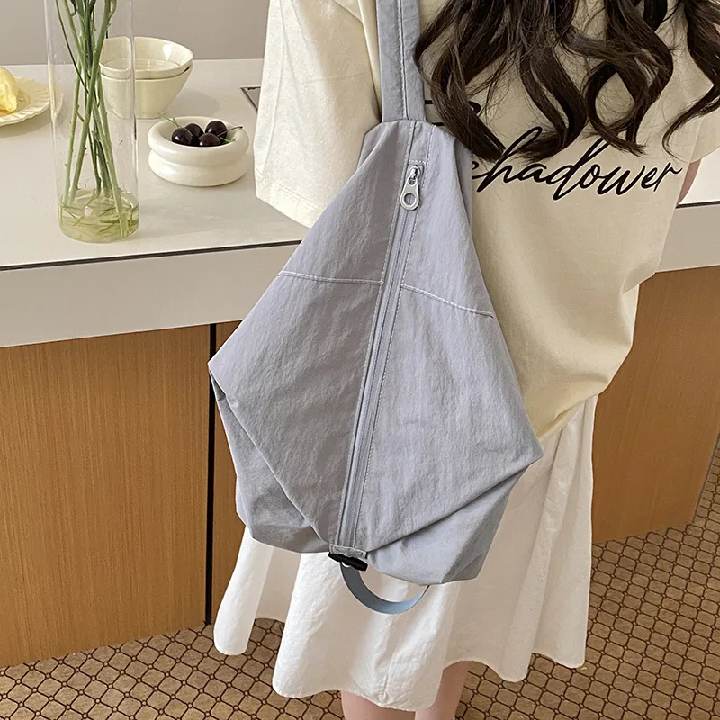 Korean Style Small Backpack Women Simple Student Schoolbag Nylon Sports Gym Bag Outward Travel Commuting Lightweight Backpack