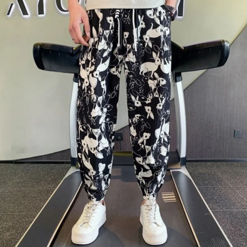 Летние тонкие мужские укороченные брюки из ледяного шелка с принтом, свободные мужские повседневные шаровары, большой размер, дизайнерская оригинальная одежда, дешевые брюки