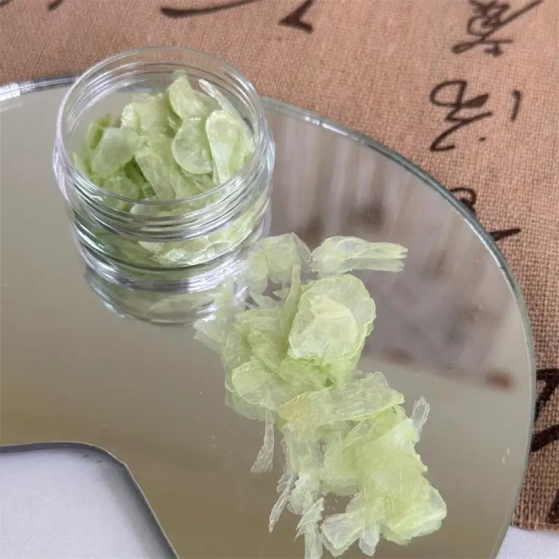 Akcesoria do paznokci do Manicure noszą naszywki do paznokci z nieregularnymi, ultracienkimi, fantomowymi płatkami w kolorze zdrowia i urody