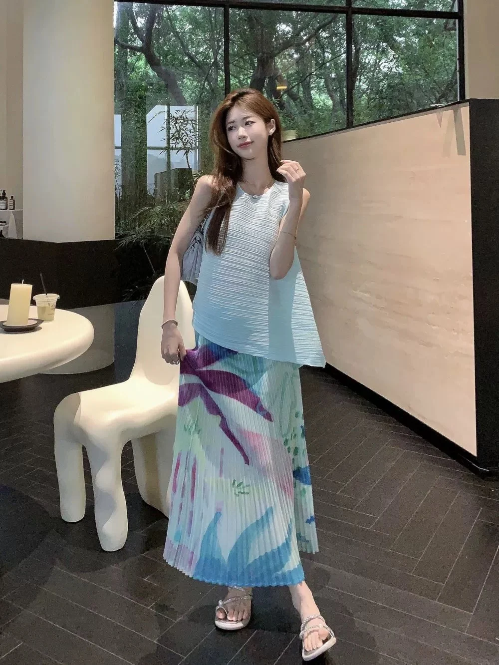 Mezza gonna stampata a pieghe Miyake 2025 Estate Nuova gonna a trapezio con sensazione premium Mezza gonna casual stile piccola fragranza