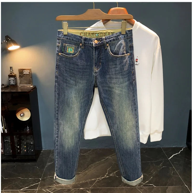 High end light luxury men's jeans trend print new autumn men's clothing casual small feet retro blue pants