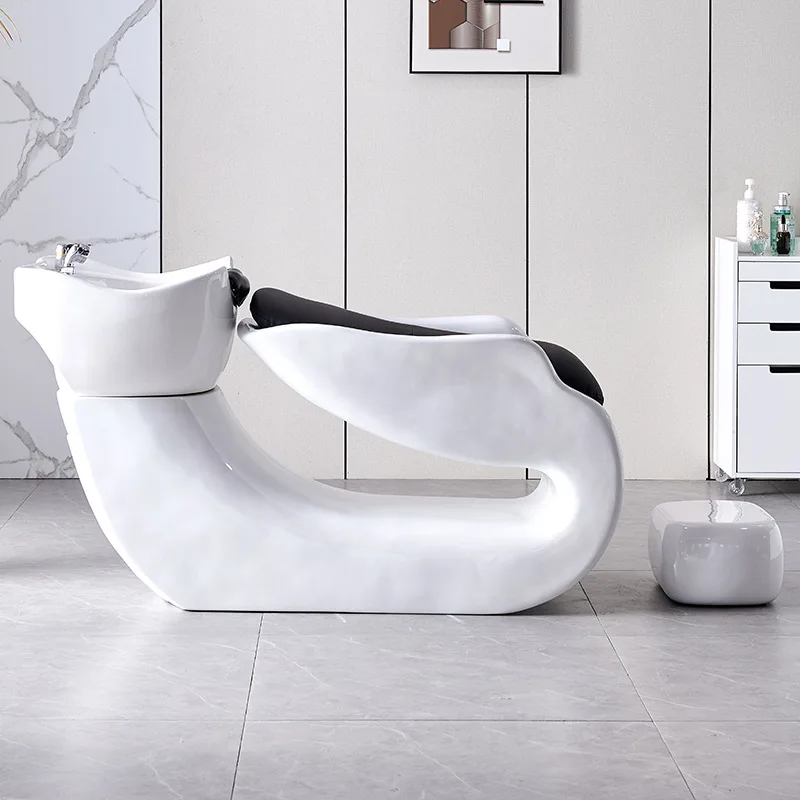 A semi reclining shampoo bed for a hair salon