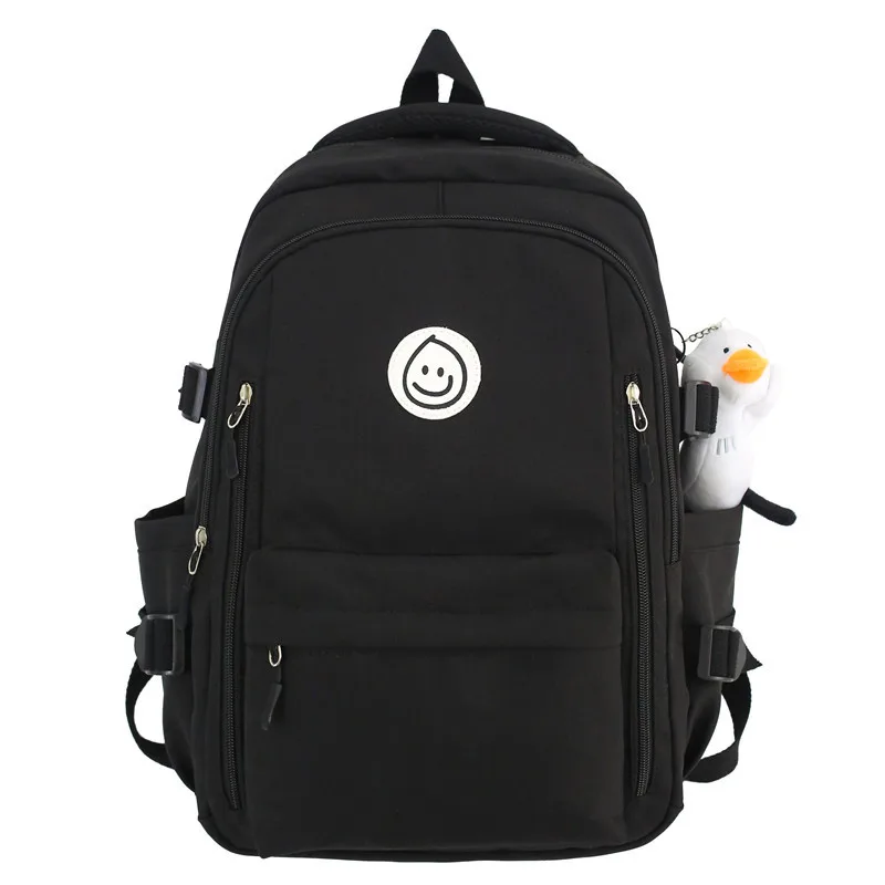 2025 new version of minority solid color backpack autumn new high school students large capacity multi-pocket schoolbag female