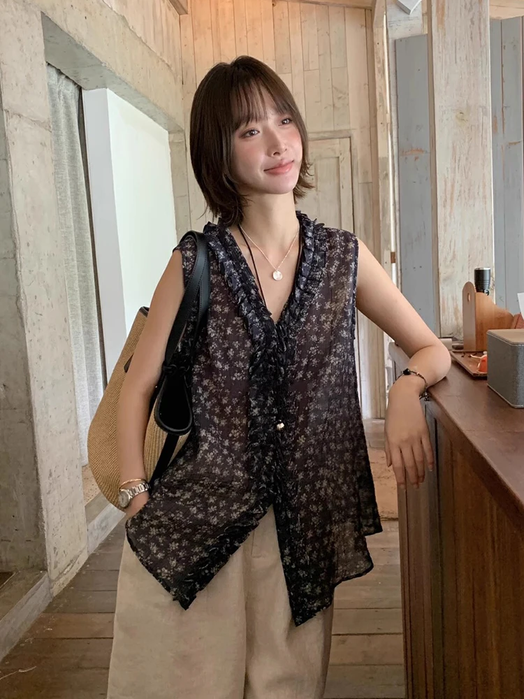 

Clothland Women Sweet Ruffled Chiffon Blouse V Neck Sleeveless Shirt Cute See Through Transparent Tops Mujer WA329