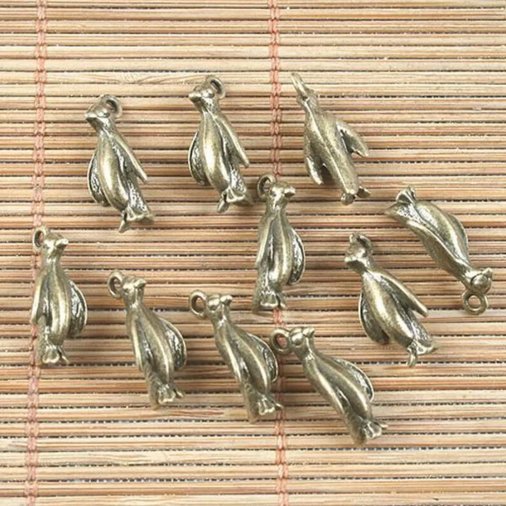 

15PCS 15x7mm hole:1mm ANTIQUED BRONZE PENGUIN DESIGN PENDANT H5034