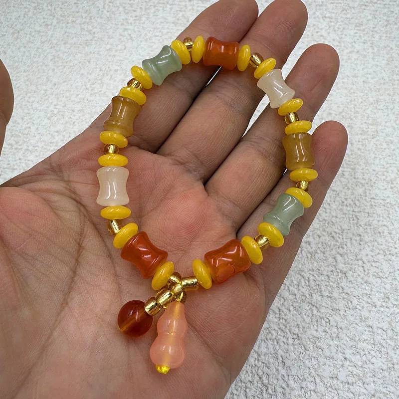 

Xinjiang Hetian Golden Silk Bamboo Knot Colorful Bracelet Couple Good Luck Men's Gobi Gift Women's Natural Bracelet