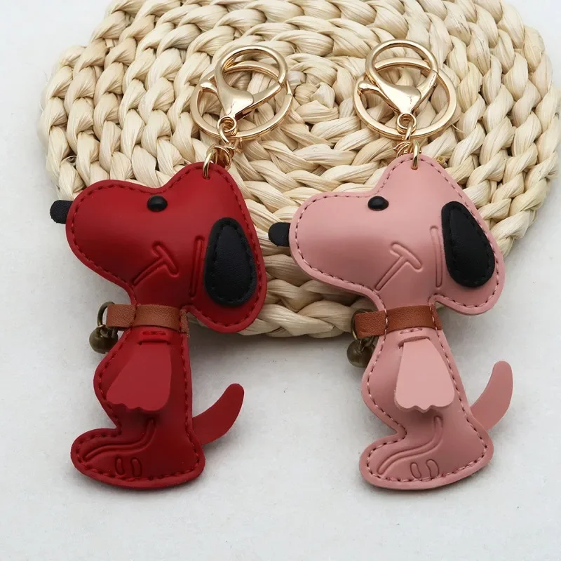 

Snoopys Creative Cute Bell Dog Keychain Fashion Couple Leather Keychain High-Grade Bag Charm & Car Key Accessories Gift